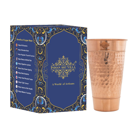 Traditional hammered copper drinking vessel