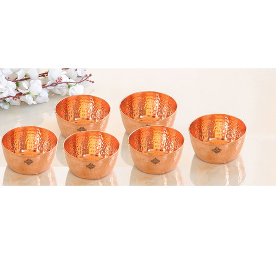Handmade hammered copper bowl with a smooth finish, ideal for enhancing your table settings or home decor