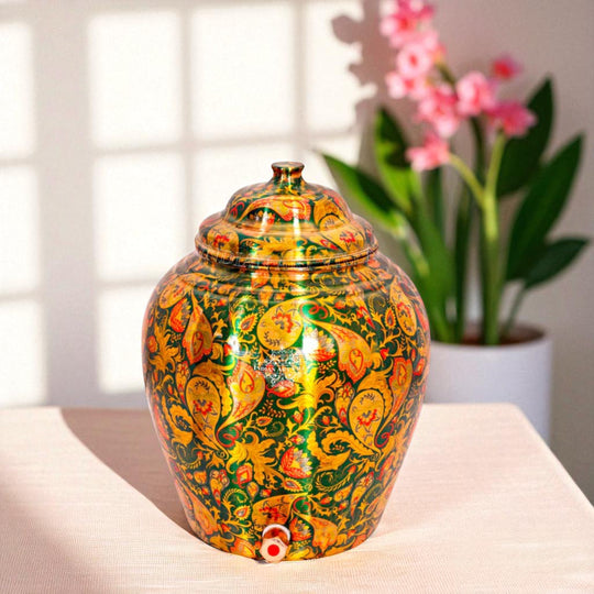 Angled view of 5L round copper matka with tap and stand assembled – copper water pot with stand