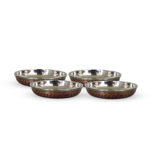 Unique hammered copper steel plate ideal for presenting rice halwa at family get-togethers or cultural celebrations.