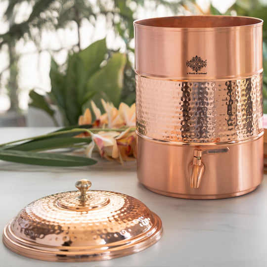 Angled view of 5L round copper matka with tap and stand assembled – copper water pot with stand