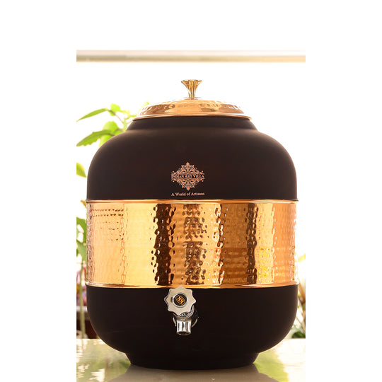 5 litre embossed copper matka with stand in dining room as traditional water vessel – tamba matka