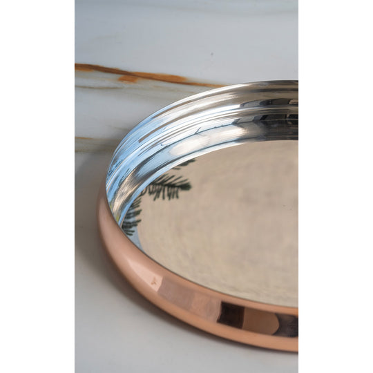 Indian Art Villa’s copper thali combining tradition with modern elegance a perfect centerpiece for your home.