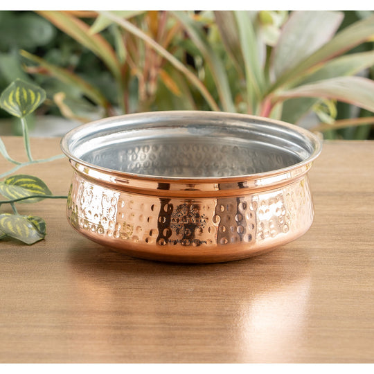 Copper cookware pot with hammered design, perfect for cooking and serving, featuring Indian Art Villa branding.
