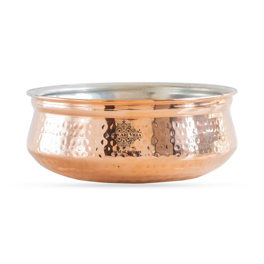 Rustic copper cooking vessel with a hammered finish, perfect for preparing meals and serving guests by indian art villa