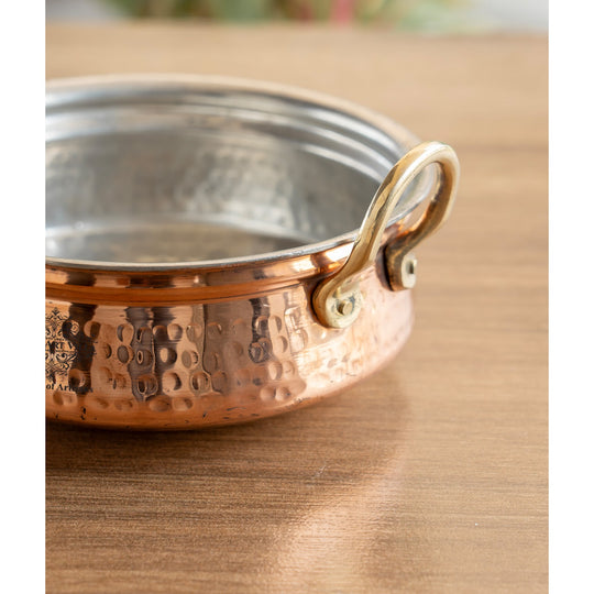 Pure copper handi with intricate hammered design and smooth tin interior perfect for formal dining.