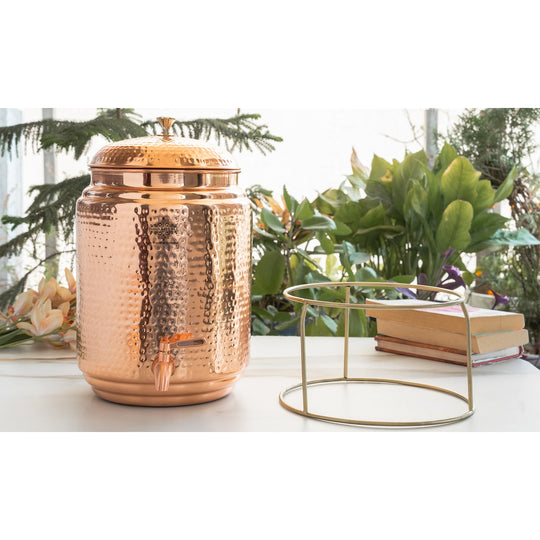 Tilted shot of 5L round copper matka showing spherical body and small opening – copper water pot