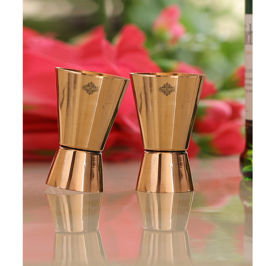 Set of 2 copper jigger shot glasses, angle view — Indian Art Villa