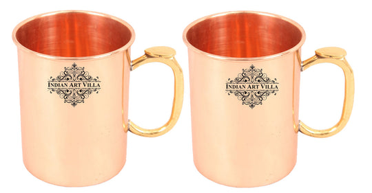 Set of 2 Indian Art Villa pure copper plain mugs with brass thumb grip handles, perfect for drinking water, cocktails, and home bars.