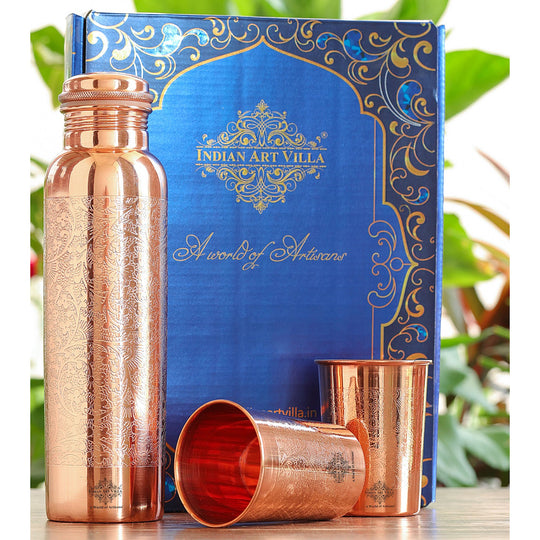 Copper water bottle and Glass set with decorative blue box labeled 'Indian Art Villa'.