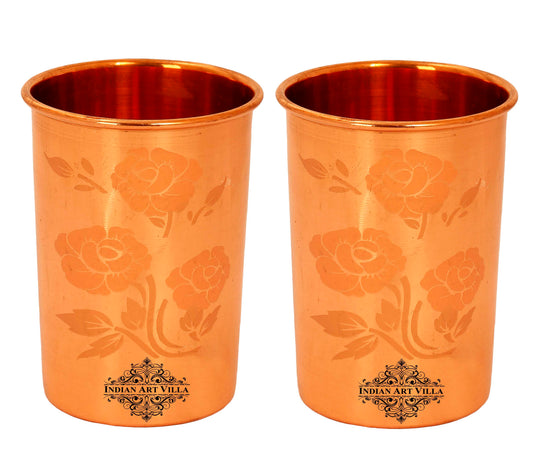 Pure copper water bottle and glass set with floral engraving and leak-proof cap, ideal for health and hydration.