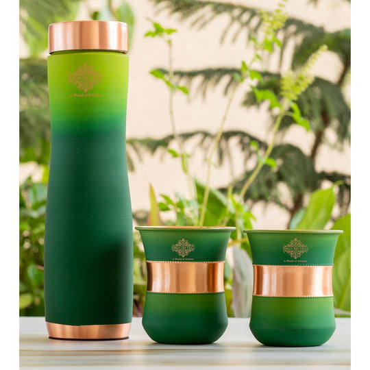 Green silk finish copper bottle with matching glasses by Indian Art Villa, designed for stylish home displays.