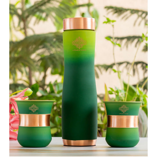 Green silk finish copper bottle with matching glasses by Indian Art Villa, designed for stylish home displays.