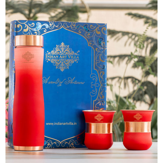 Stylish red ombre copper bottle set with matching glasses by Indian Art Villa, perfect for modern living and décor.