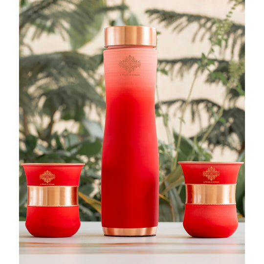 Stylish red ombre copper bottle set with matching glasses by Indian Art Villa, perfect for modern living and décor.