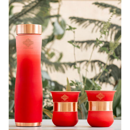 Stylish red ombre copper bottle set with matching glasses by Indian Art Villa, perfect for modern living and décor.
