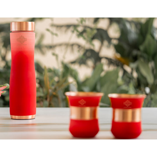 Stylish red ombre copper bottle set with matching glasses by Indian Art Villa, perfect for modern living and décor.