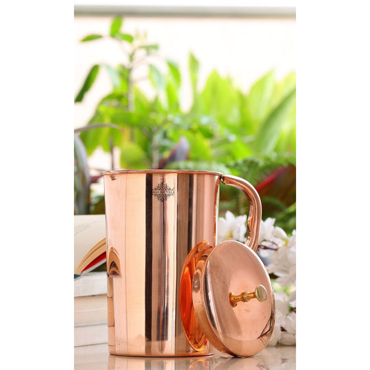 Premium handcrafted copper drinkware gift set, featuring a bottle and tumblers with a sleek shine finish design.