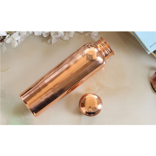Premium handcrafted copper drinkware gift set, featuring a bottle and tumblers with a sleek shine finish design.