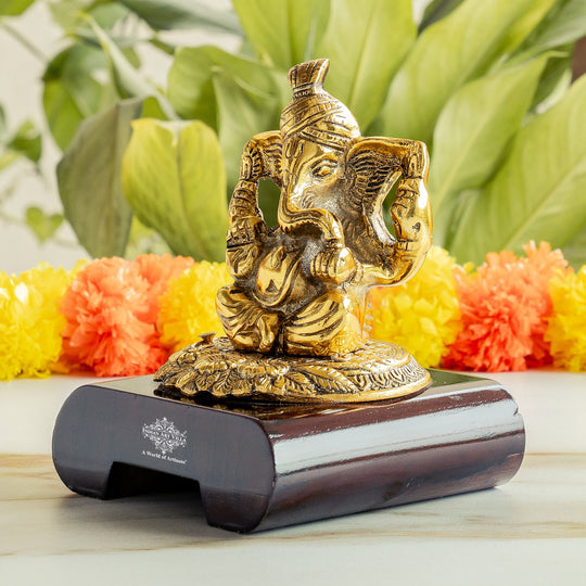 Brass Finish Ganesh Ji Murti with Wooden Base