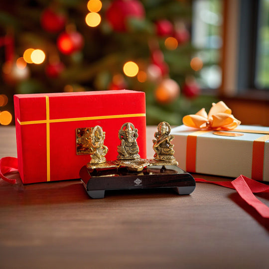 Brass Finish Ganesh Ji Laxmi JI & Saraswati Ji Murti On Wooden Base