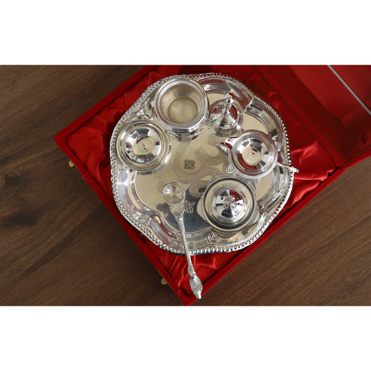 Indian Art Villa silver-plated pooja thali set with 9 accessories, a traditional religious gift item for festivals and rituals.