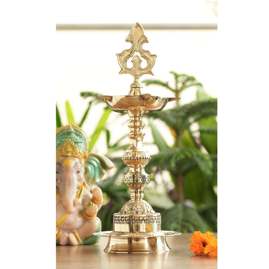 brass standing diya