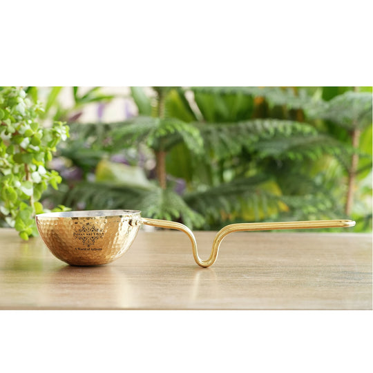 Elegant Indian Art Villa brass tadka pan with polished hammered finish tin lining and handle suitable for Indian cooking