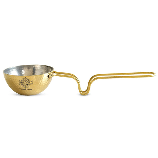 Stylish hammered brass tadka pan with extended handle reflective polished shine and tin lining for making tadka recipes