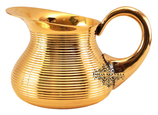 Crafted with precision this brass jug showcases artisan detail and bold form for cultural dining or sacred ceremonies
