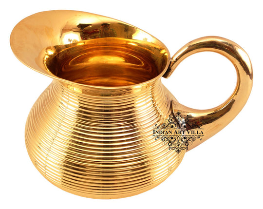 This golden brass jug offers a soft glow and traditional charm suitable for home decor festive use and spiritual rituals