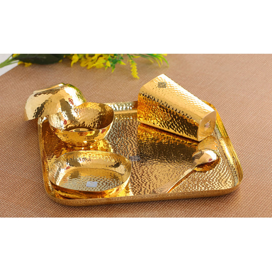 Indian Art Villa hammered brass dinner set with plate, bowls, glass, and spoon, perfect for traditional Indian dining.