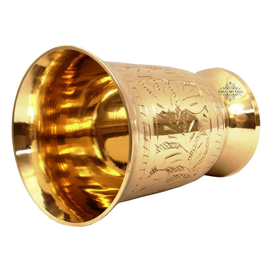 Decorative brass glass with stunning leaf embossing, combining elegance and functionality for your table setting.