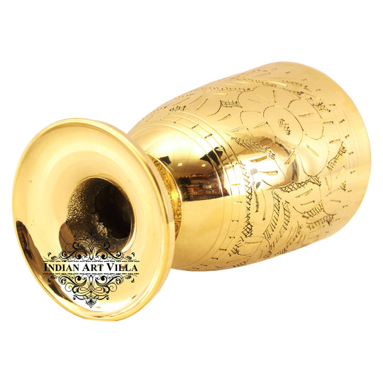 Pure brass tumbler with leaf embossed design handcrafted for spiritual use healthy drinking and luxury presentation
