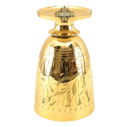 Brass glass with leaf embossed detailing made for divine settings elegant table arrangements and holistic traditions
