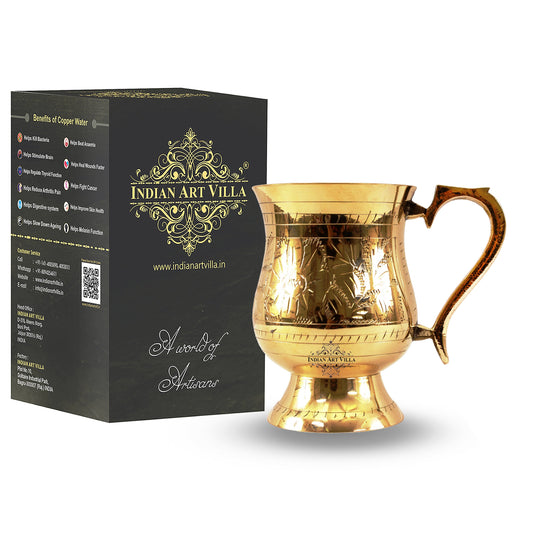 Exquisite pure brass tumbler designed in Mughlai style with intricate engravings perfect for adding elegance to table.
