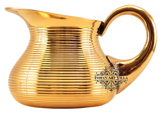 Brass jug with lining design from Indian Art Villa featuring a curved body and warm finish perfect for elegant Indian homes
