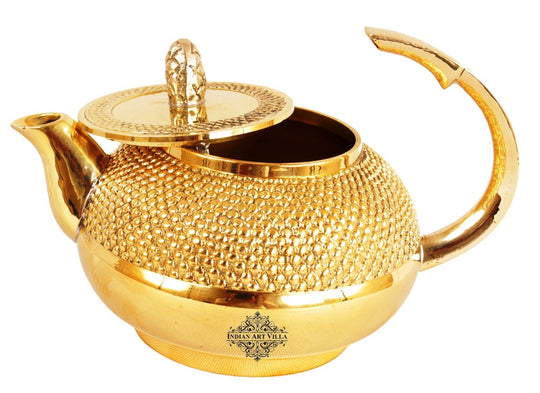 A teapot is a a vessel with a Lid, spout and a handle in which tea is brewed and from which it is served.