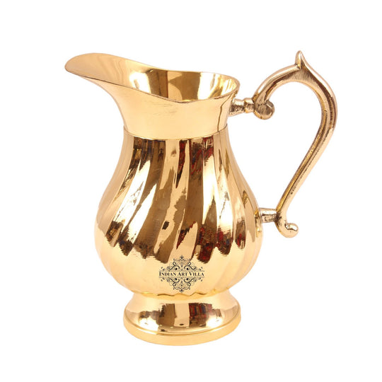 stylish brass lining jug pitcher with graceful curved handle shiny antique serveware item by indian art villa