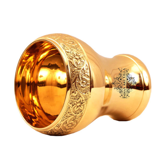 Brass glass with Mughlai design and curved shape perfect for serving beverages in a traditional and royal style