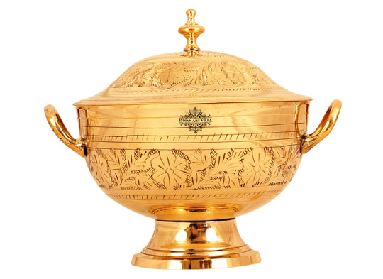 Indian Art Villa brass handi with floral engraving and lid, ideal for serving traditional Indian dishes in style.