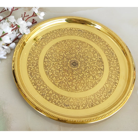 Indian Art Villa handcrafted brass plate with double circle floral etching and radiant gold toned traditional finish