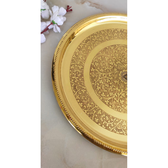 Pure brass thali with dual floral ring engraving and mirror shine finish designed by Indian Art Villa for heritage lovers