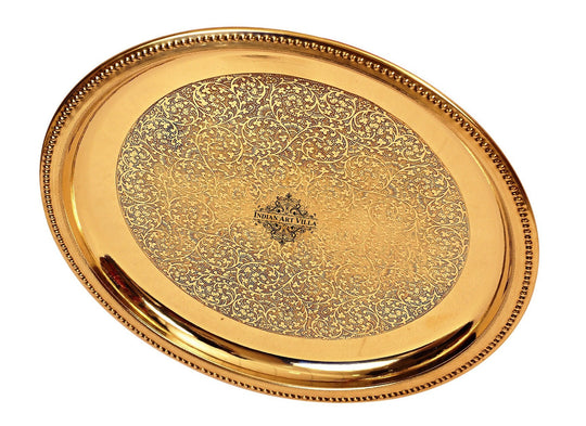 Floral engraved pure brass plate with decorative border and polished surface in round form by Indian Art Villa