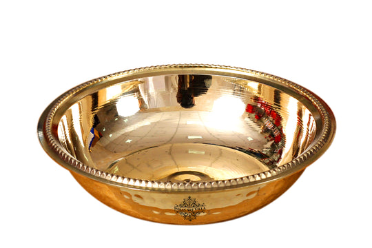 Indian Art Villa brass rice plate crafted by hand with a hammered design and soft round shape in polished golden tone
