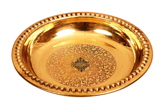 Traditional brass rice plate from Indian Art Villa featuring embossed center and beaded edge in golden mirror polish