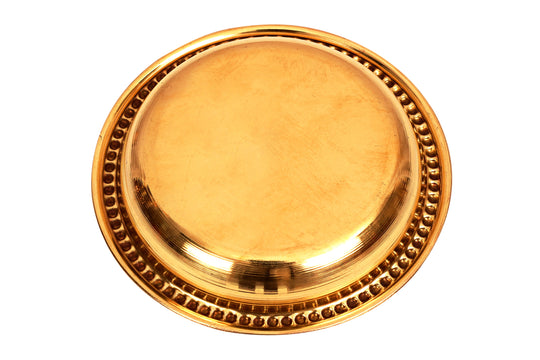 Round pital thali set with flat embossed base and lifted edge accented with a clean symmetrical dotted design