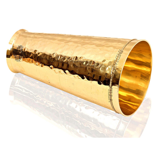 Handmade brass lassi glass with a refined hammered texture, offering both style and practicality for your drinks.