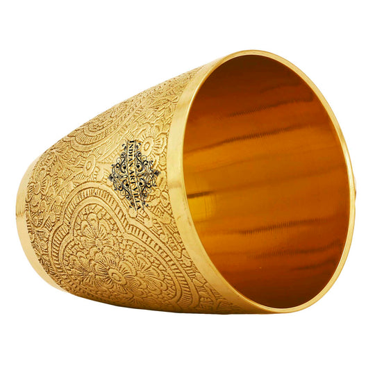 Floral embossed pure brass glass designed to bring a refined touch to any traditional drink occasion.