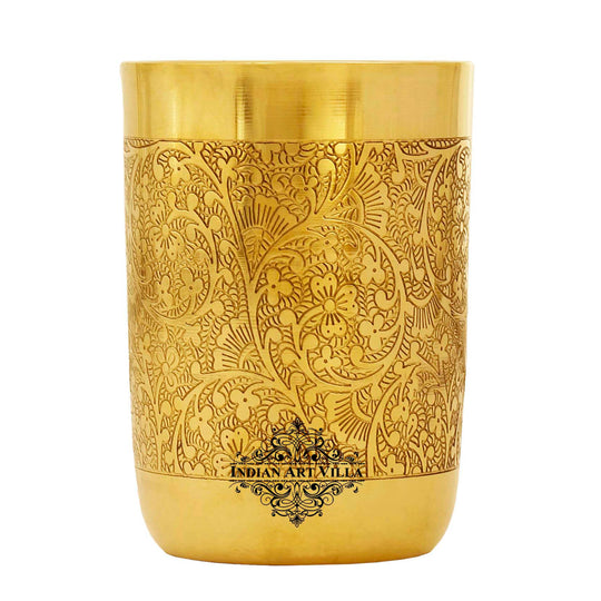 Handmade brass glass featuring beautifully embossed flowers designed to enhance your dining experience with its artistic touch.